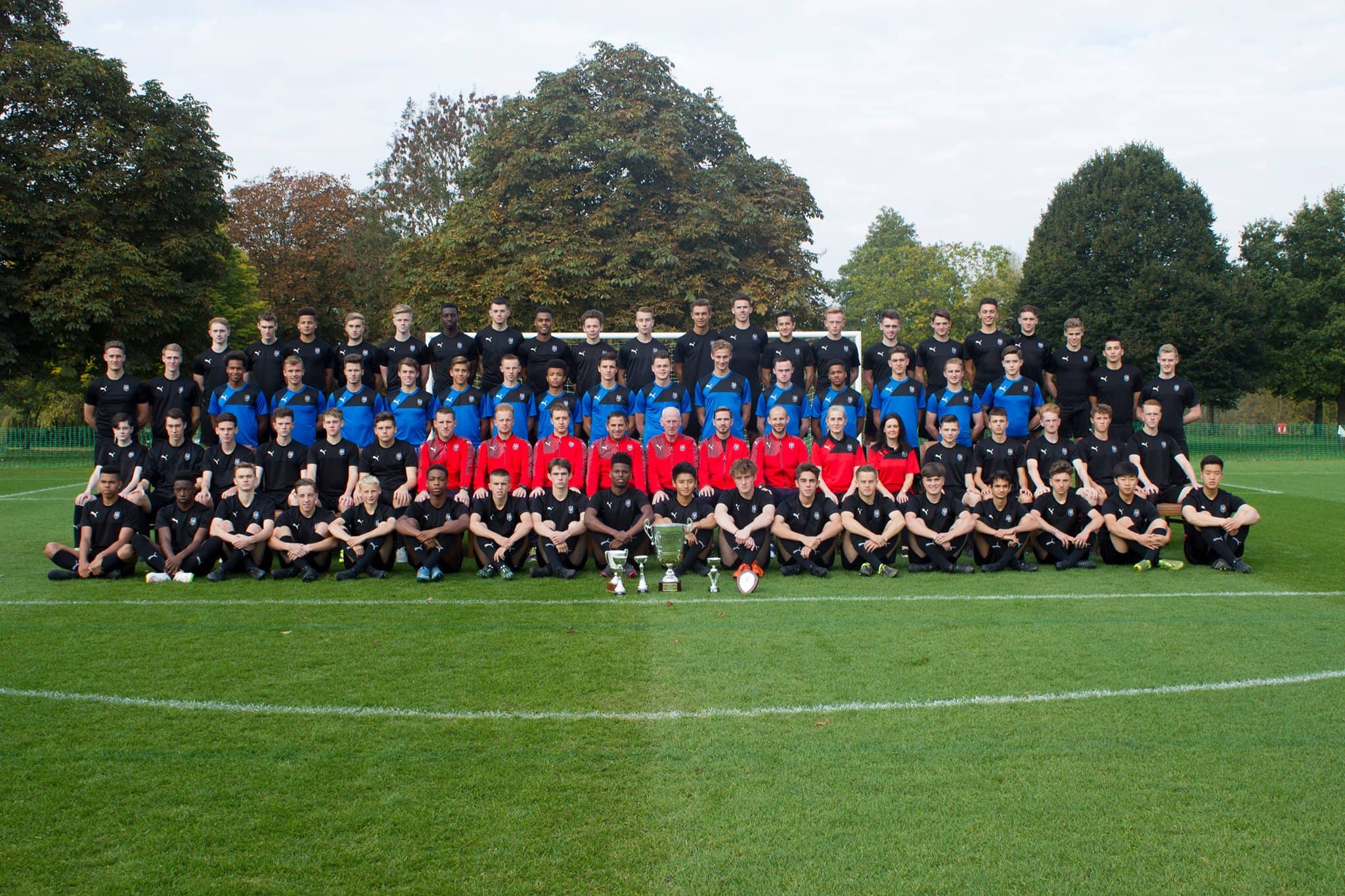 Students and coaching team of the FAB football academy in London, England 